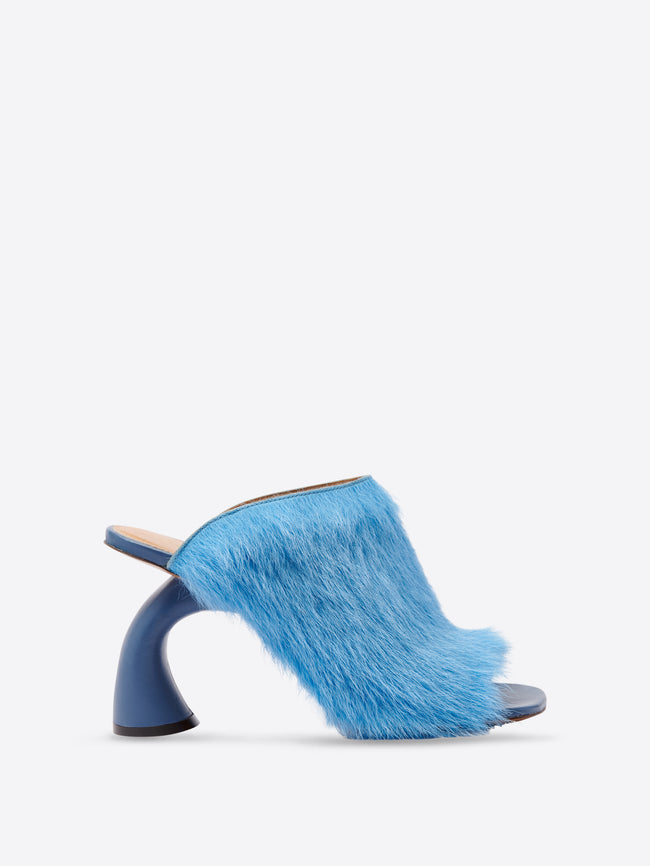 Mules in leather-trimmed calf hair