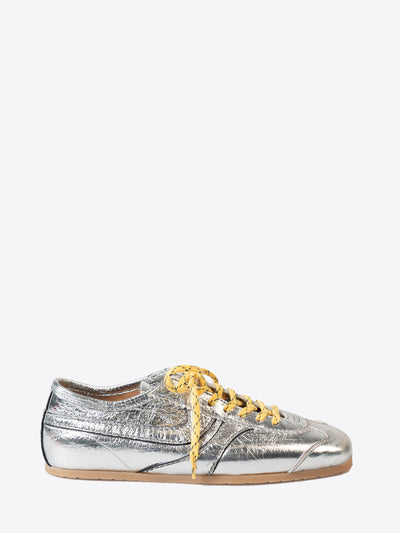 Silver sneaker with yellow laces on a white background - Dries Van Noten