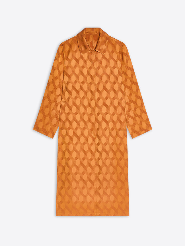 Orange jacquard mac with chain motif on a white background