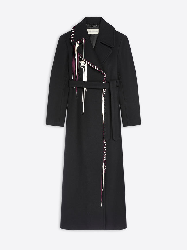 Long belted black coat with white and burgundy detailing on white background 