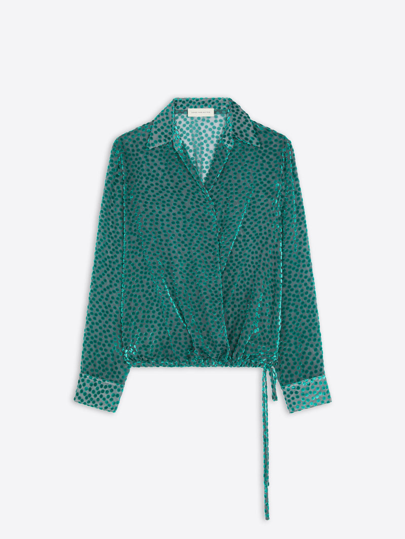 Turquoise patterned and textured shirt with a tie on a white background