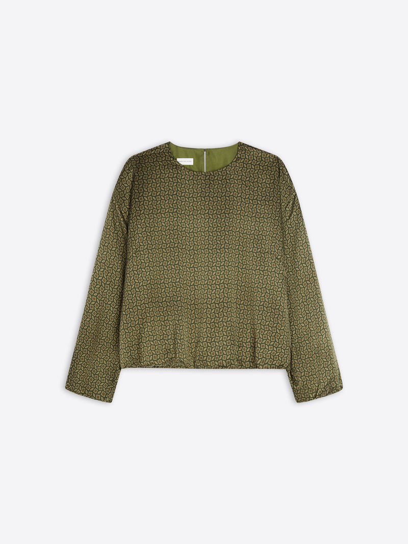 Green patterned blouse on a white background