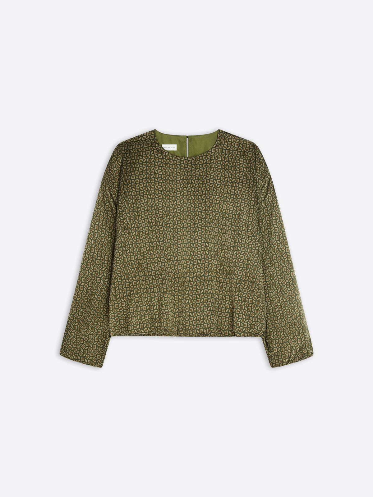 Green patterned blouse on a white background