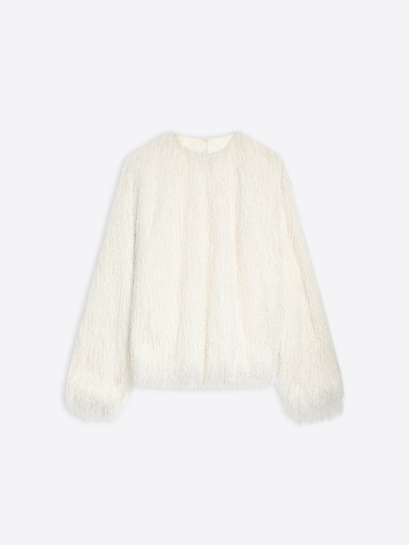 White fluffy top on a white background