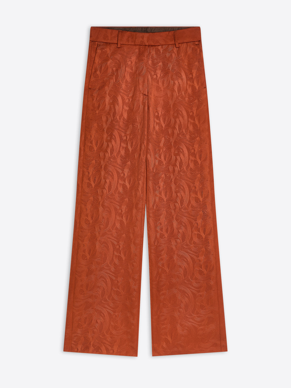 Rust coloured textured pants on a white background