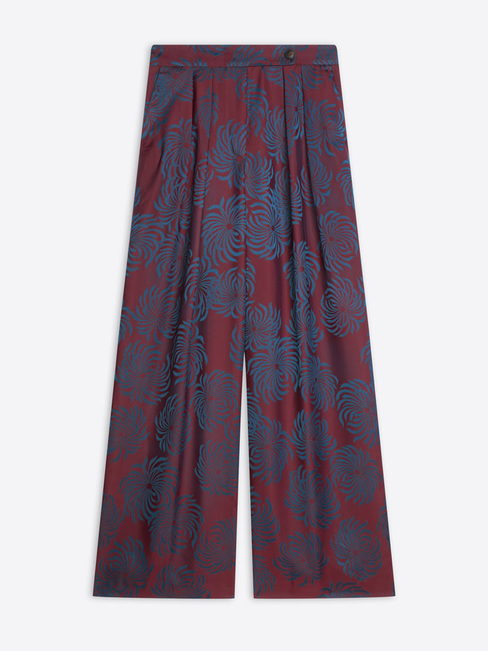 Red and blue patterned pants on a white background
