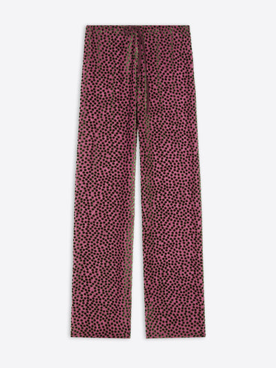 Pink pants with black polka dot pattern on a white background - Dries Van Noten