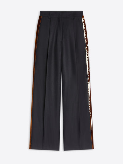 Navy pants with white and brown striped side tassels on a white background - Dries Van Noten
