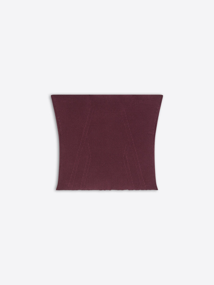 Burgundy knitted top on a white background