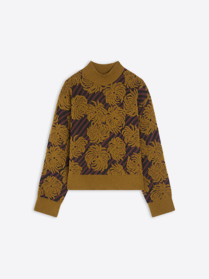 Brown sweater with floral pattern on a white background
