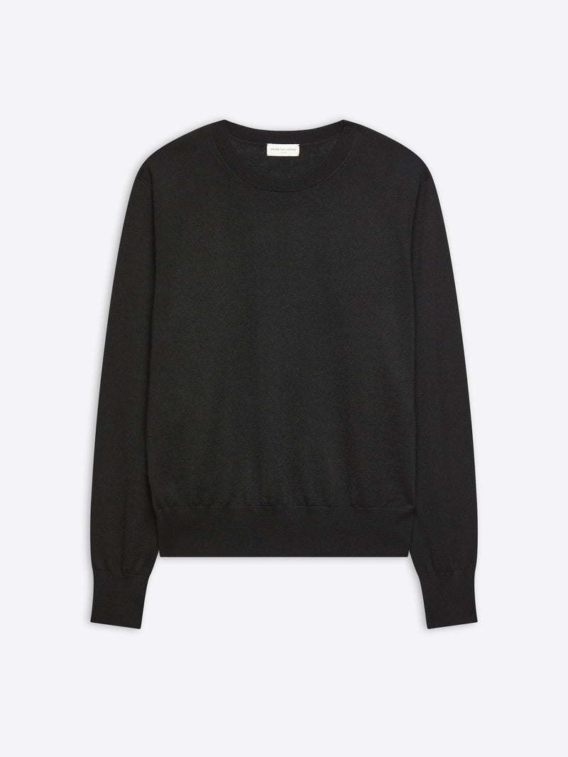 Black sweater on a light gray background