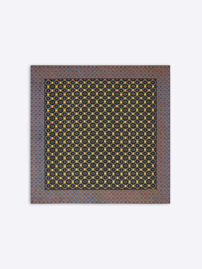 Patterned scarf with geometric design on a white background