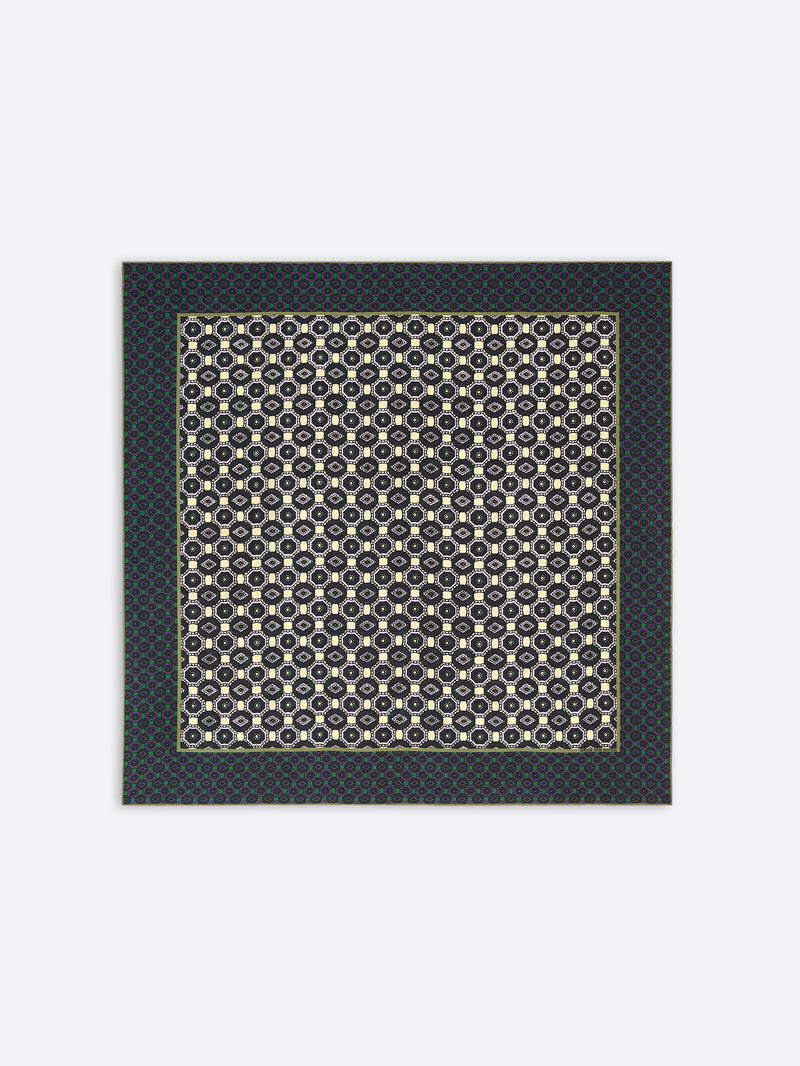 Patterned scarf with geometric design on a plain background