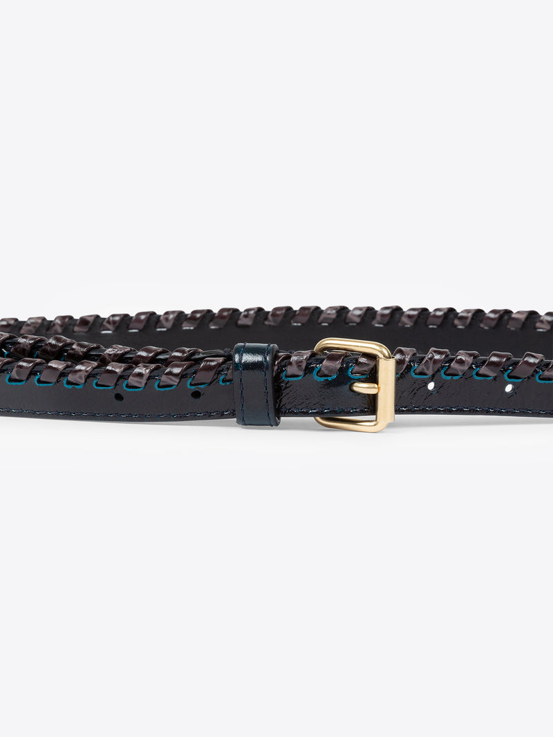 Black studded belt with a gold buckle on a white background