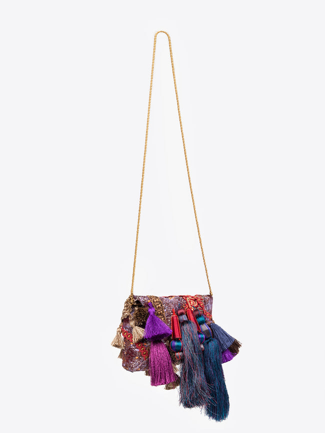 Colorful handbag with tassels on a white background