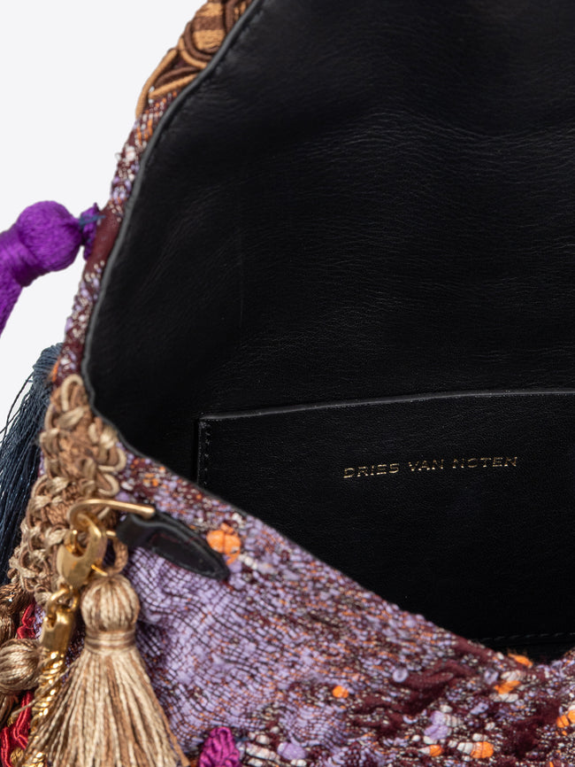 Colorful handbag with tassels on a white background