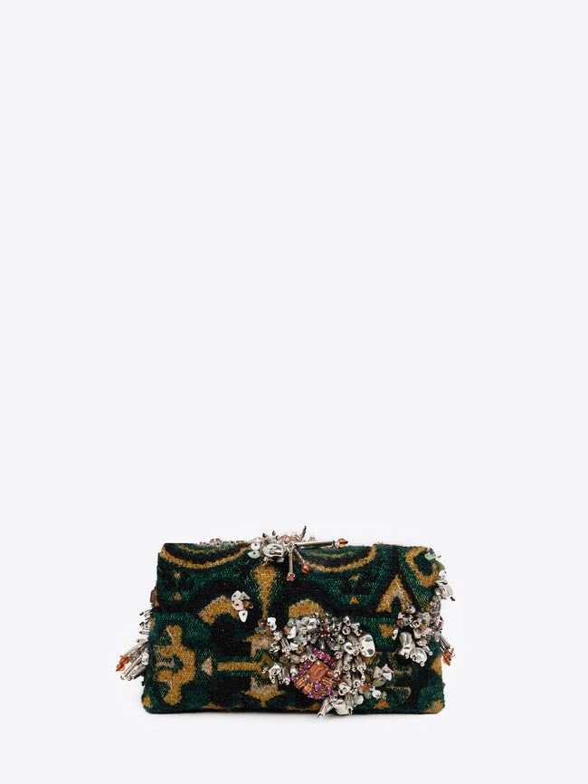 Clutch bag with floral embellishments on a white background