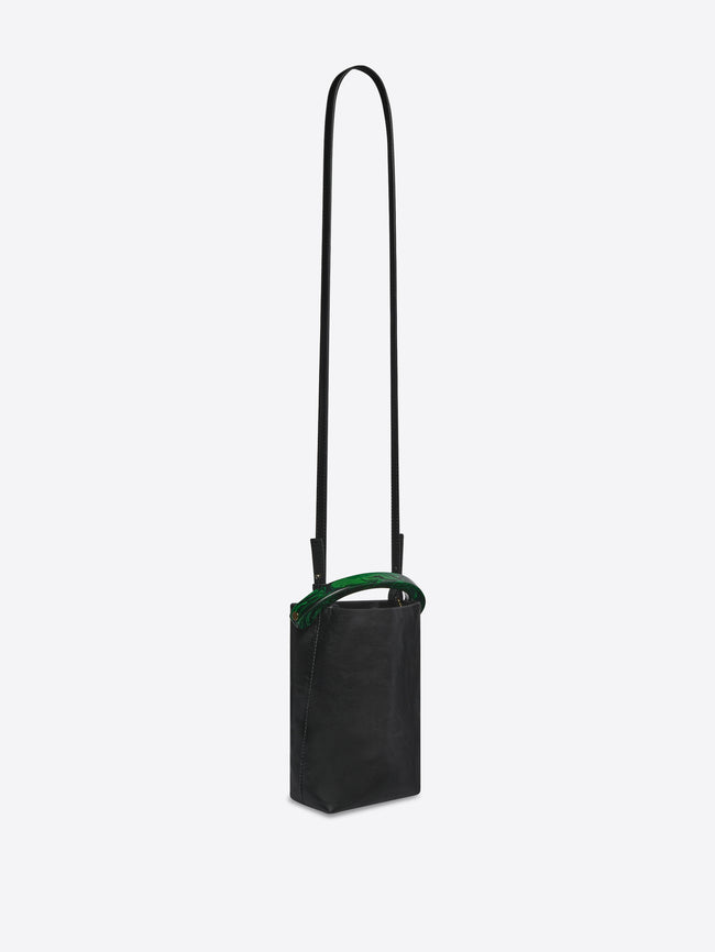 Black bag with a green accent on a white background