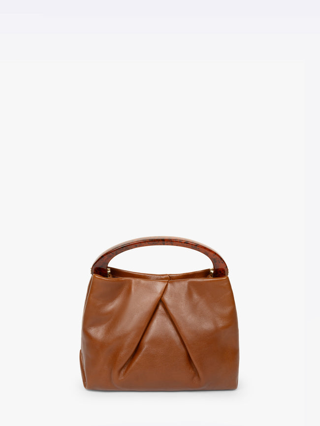 Brown leather handbag on a white background