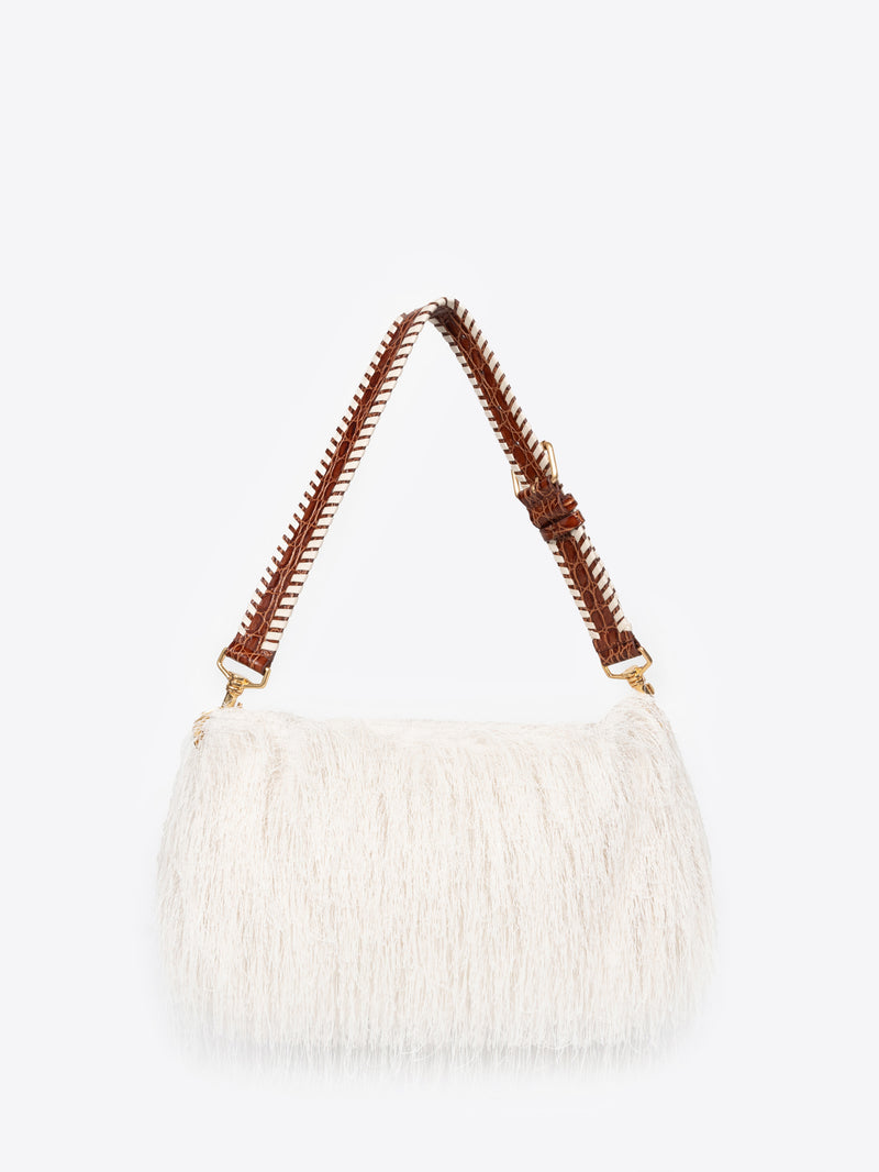White handbag with brown handle on a white background