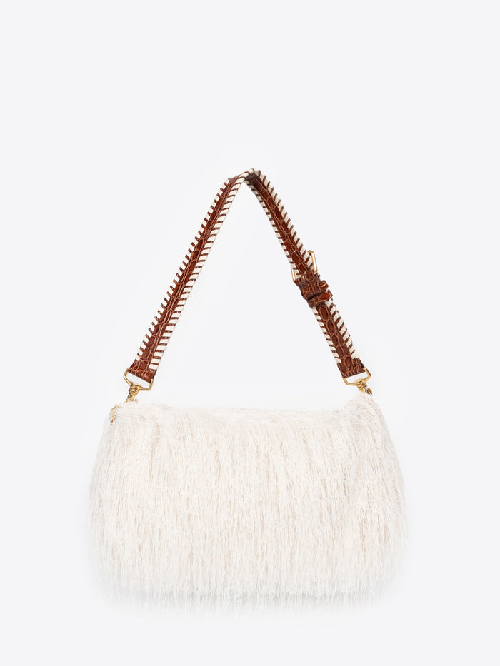 White handbag with brown handle on a white background