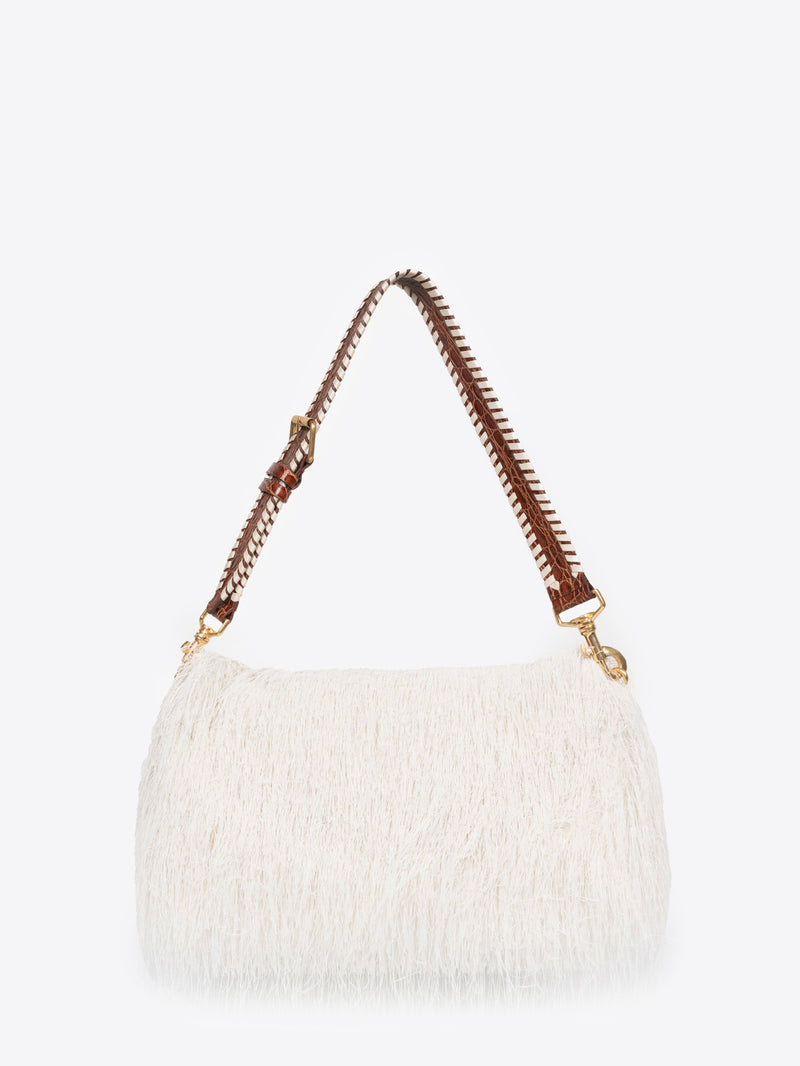 White textured handbag with brown chain handle on a white background