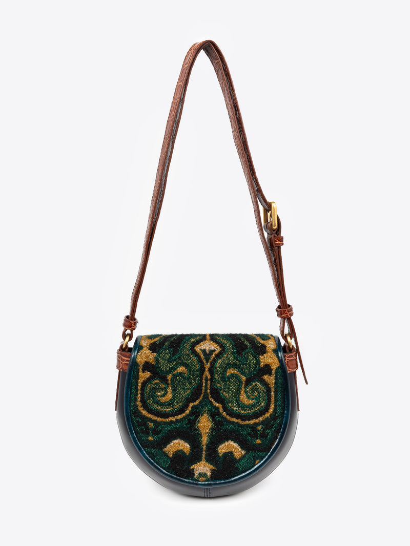 Handbag with decorative pattern on a white background