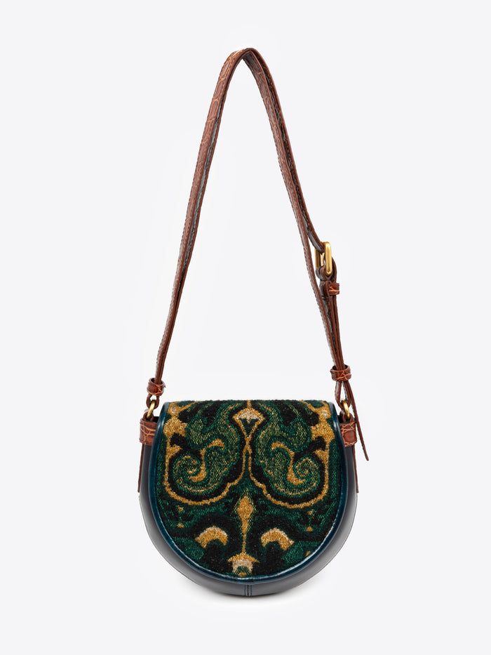 Handbag with decorative pattern on a white background