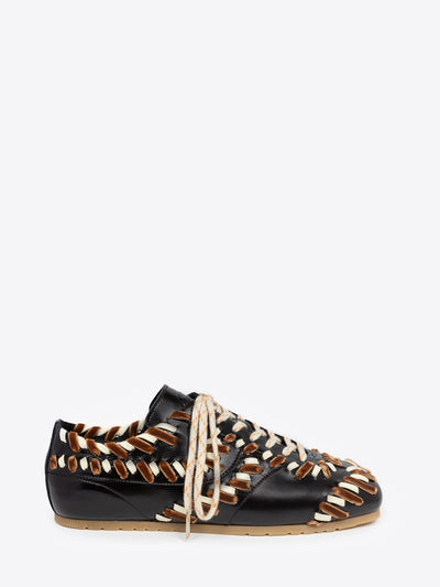 Stitch embellished, black leather sneaker on a white background - Dries Van Noten