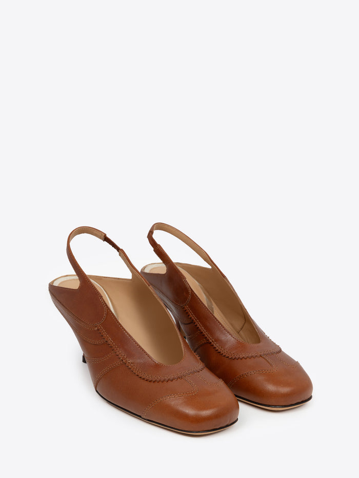 Brown leather slingback shoe on a white background
