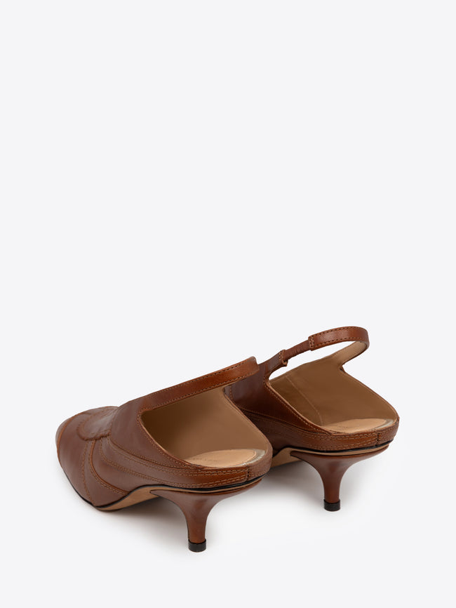 Brown leather slingback shoe on a white background