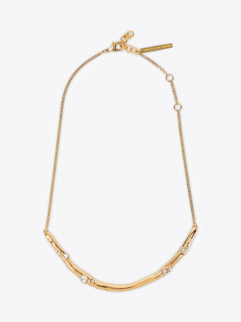 Gold necklace with small pearls on a white background