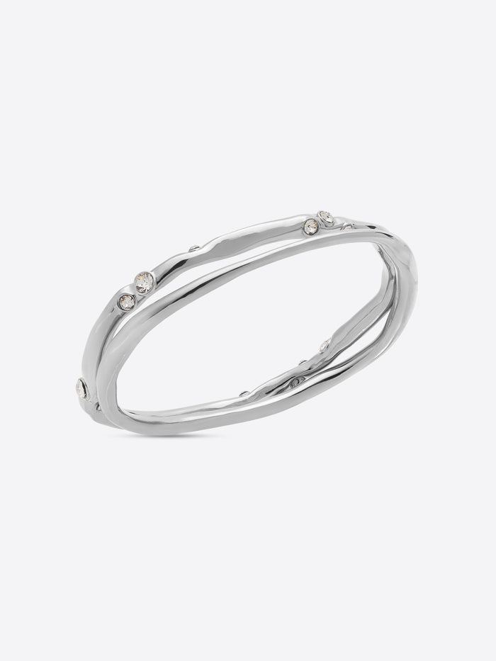Silver bracelet with small stones on a white background