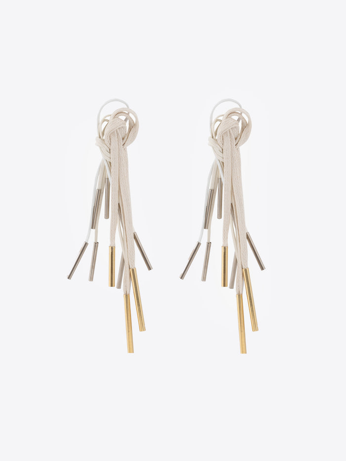 Pair of earrings with multiple dangling strands on a white background