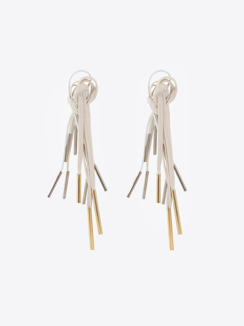 Pair of earrings with multiple dangling strands on a white background