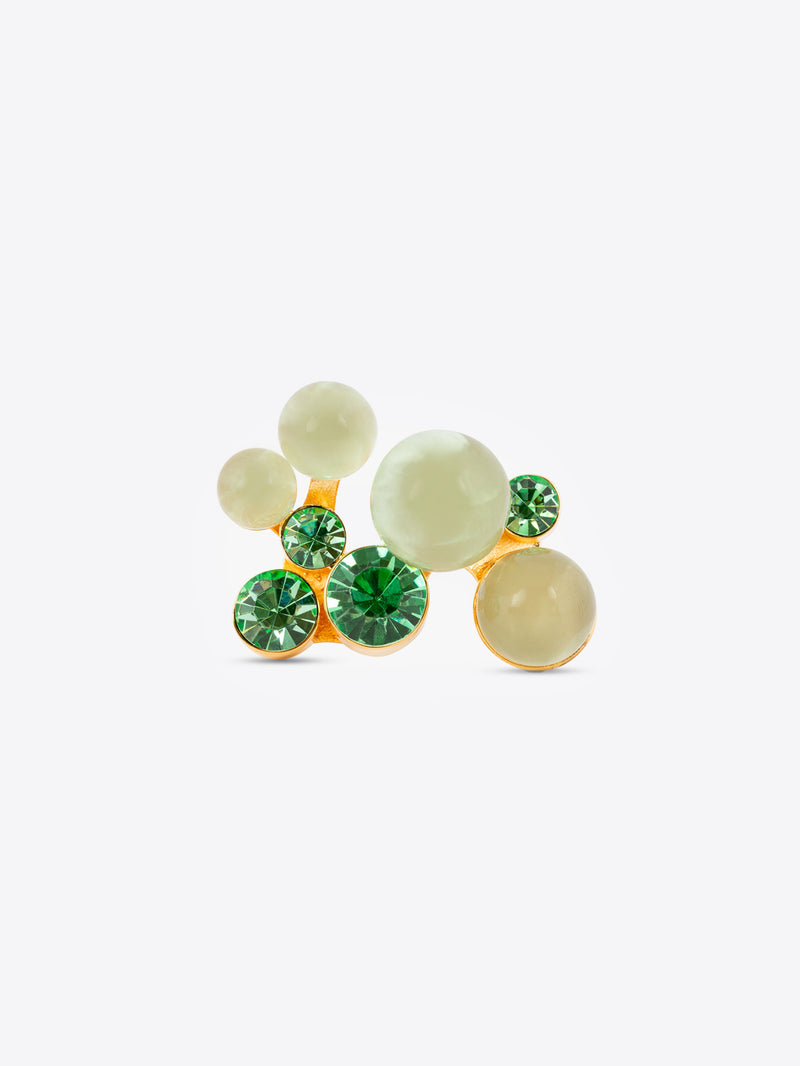 Pair of earrings with green and beige stones on a white background