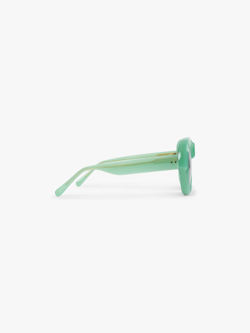 Mint green sunglasses on a white background