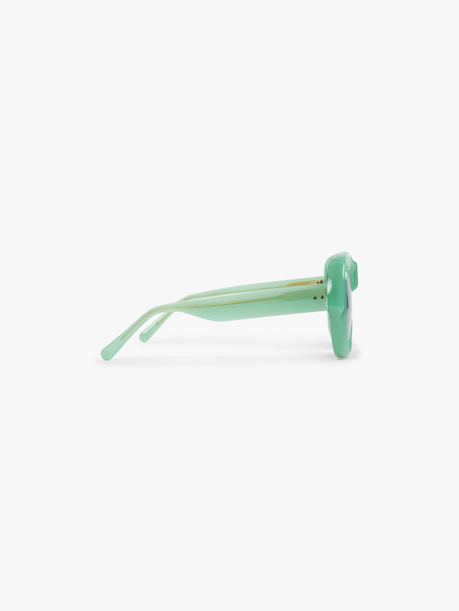 Mint green sunglasses on a white background