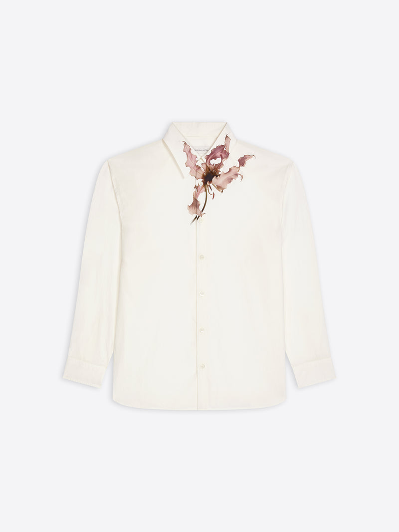 White, loose cotton shirt with a pink floral print on a white background