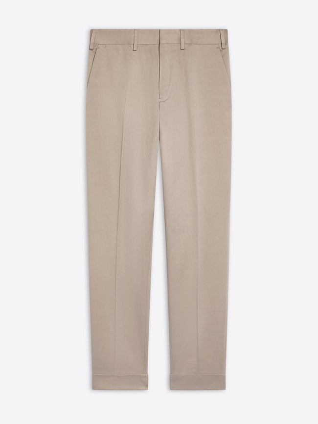Cement colored cuffed pants on a white background