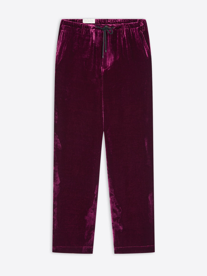 Purple velvet pants on a white background