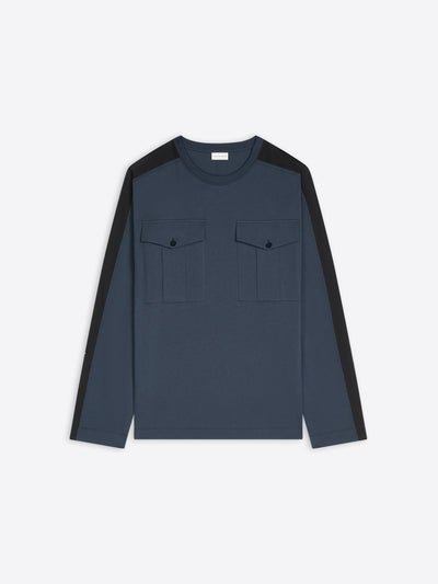 Navy colored long sleeve tee with front pockets and black sleeve detail on a white background - Dries Van Noten