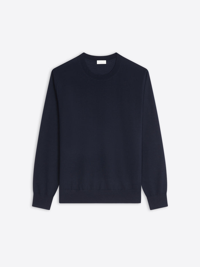 Navy blue sweater on a light gray background