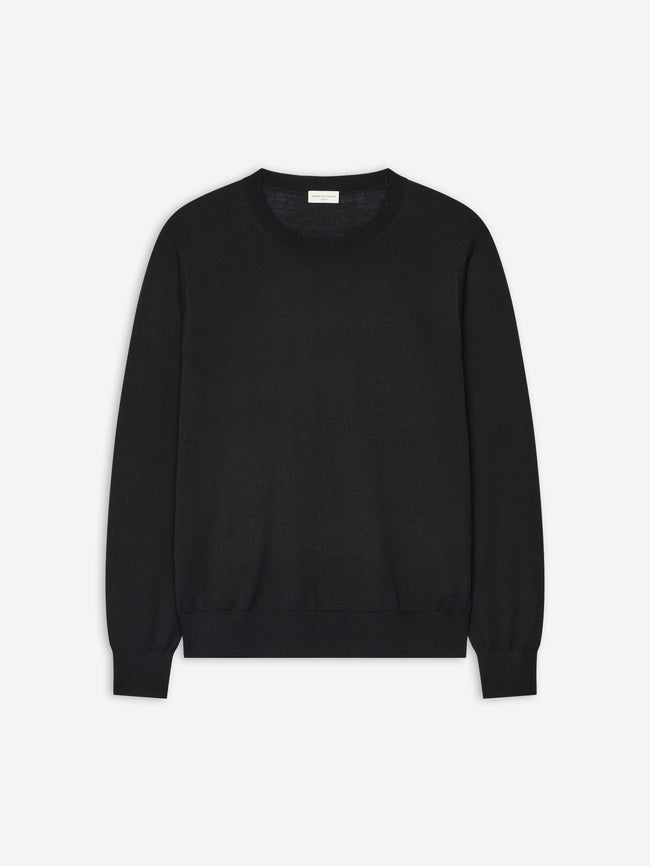 Black sweater on a light gray background