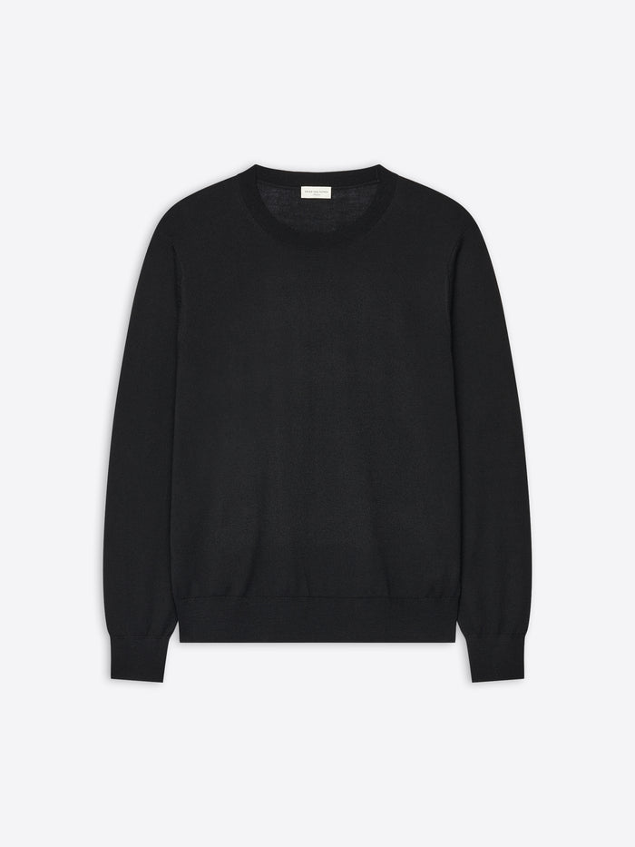 Black sweater on a light gray background