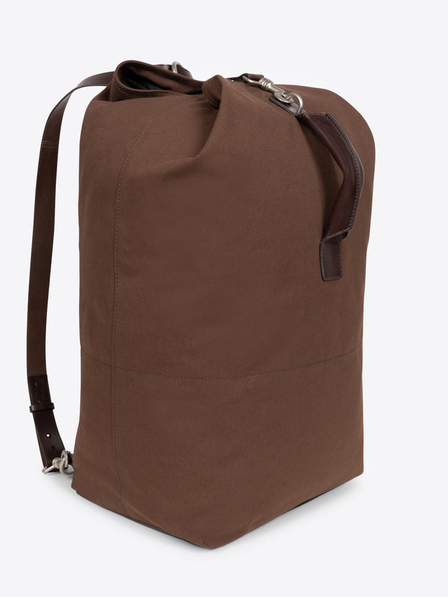 Brown duffel bag on a white background
