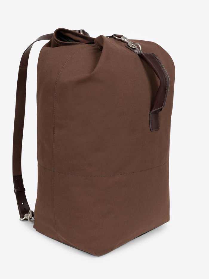 Brown duffel bag on a white background