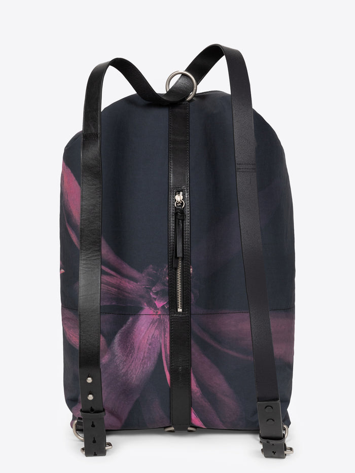 Bordeaux black duffel backpack with a floral design on a white background