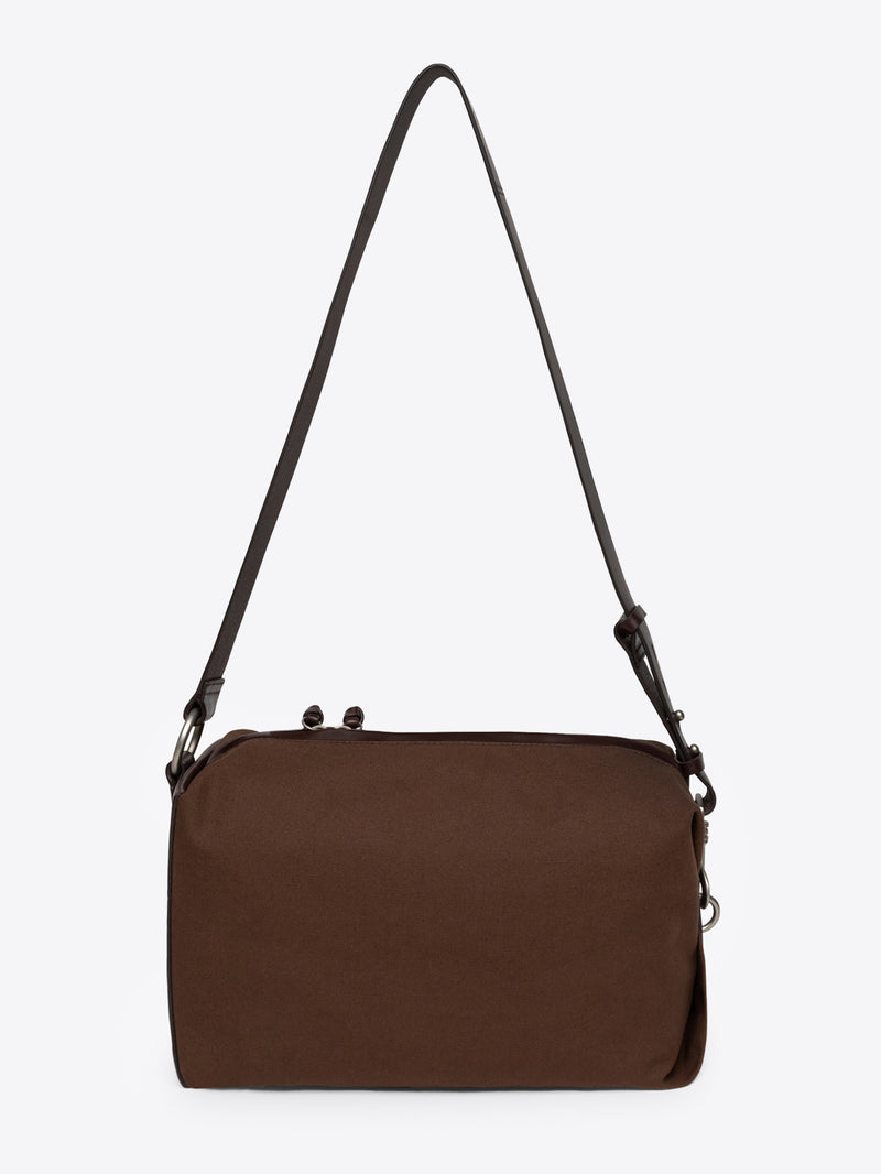 Dark brown shoulder bag with a strap on a white background
