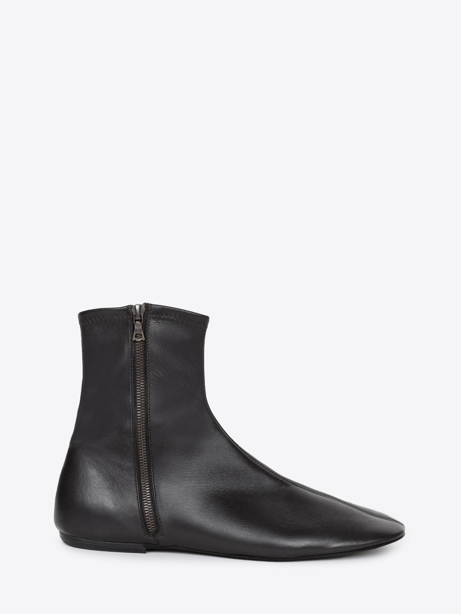 Black leather ankle boot with a zipper on a white background